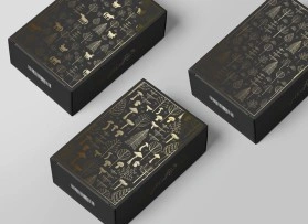 Black folding carton with golden embossing