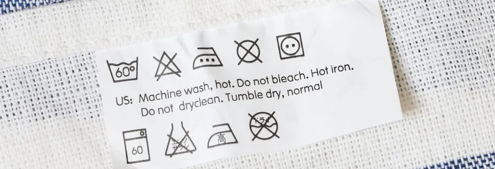 Verschiedene Symbole auf Textiletikett Verschiedene Symbole auf Textiletikett